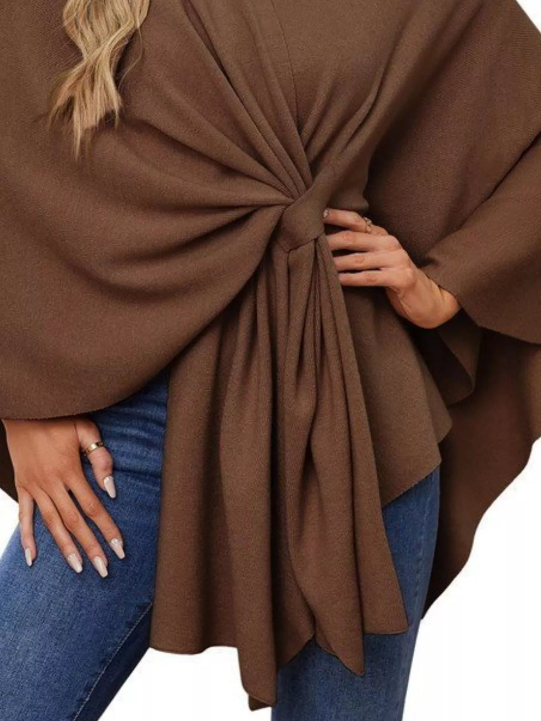 Women’s shawl cape close-up: front tie knot with gathered pleats over denim