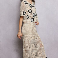 Natural crochet maxi skirt with black granny-square border and textured stripe panels