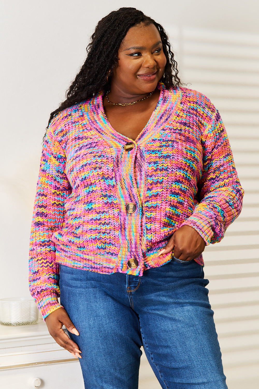 Multicolor v-neck knit cardigan with button-front and long sleeves, ribbed hem