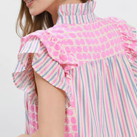 Pink and stripe tiered dress close-up of ruffle collar and flutter sleeve, dot print