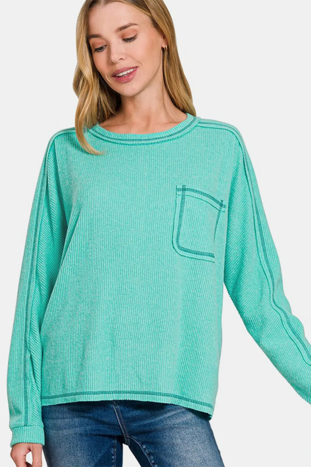 Turquoise brushed ribbed knit top, crew neck, long sleeves, contrast-stitched pocket