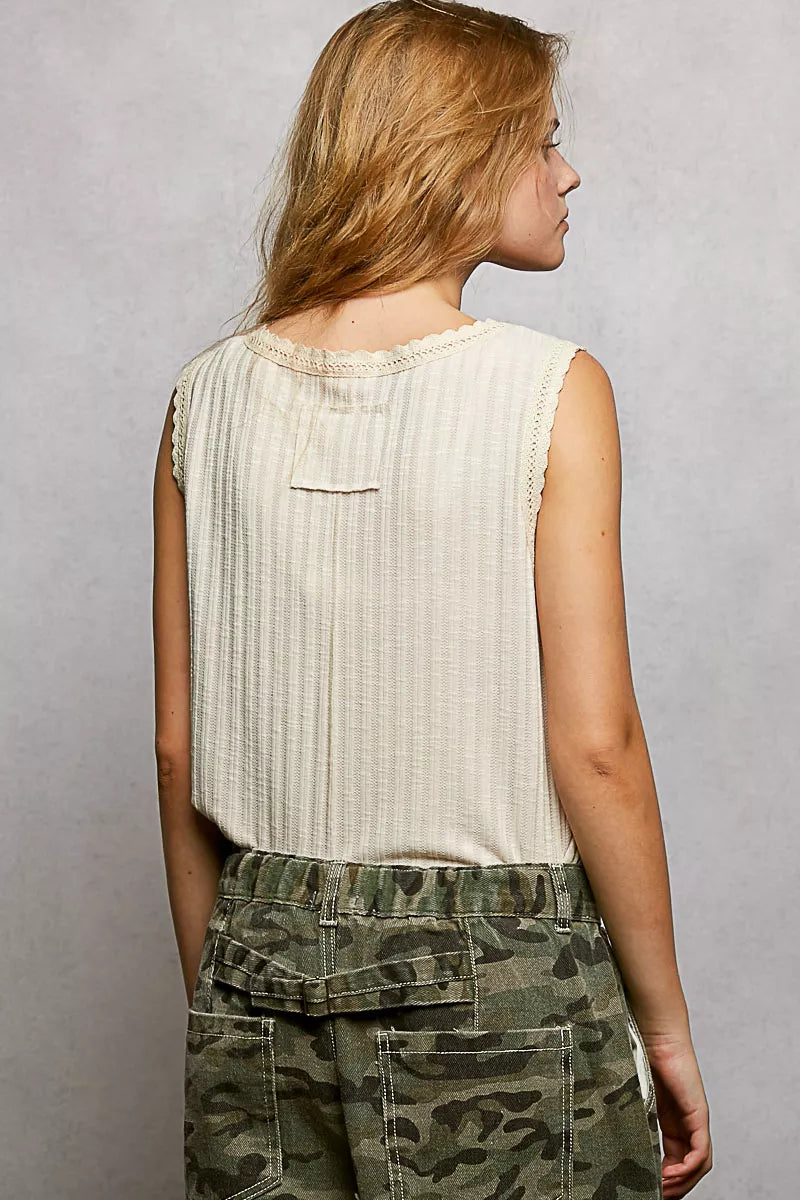 Beige ribbed sleeveless tank back view with scalloped lace neckline trim