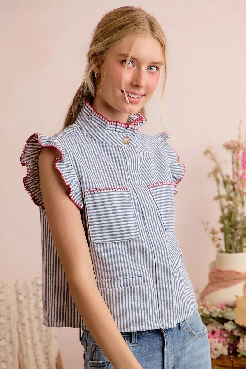 Blue and white striped vest top with ruffled shoulders, high collar, and red piping
