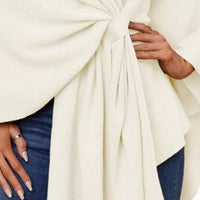 Ivory shawl cape gathered front tie with pleats and knot detail