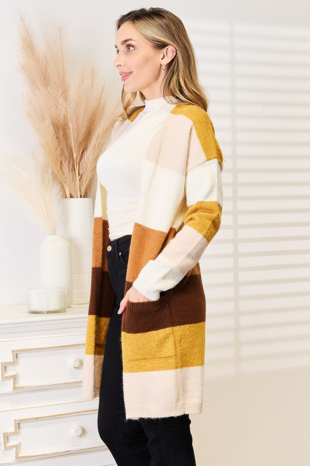 Color-block cardigan with dropped shoulders, cream and brown stripe panel on long sleeves