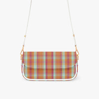 Plaid crossbody bag with white strap, front flap, and gold chain trim