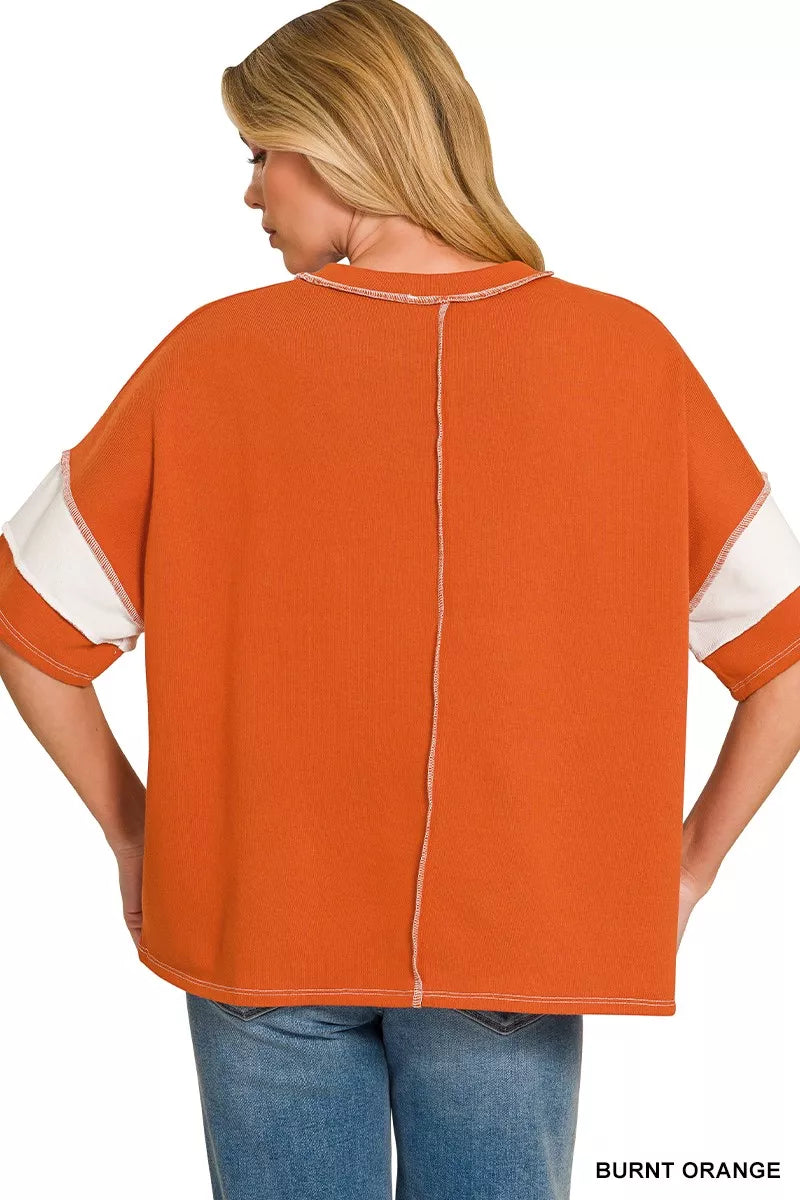 Burnt orange striped terry top, crew neck, exposed center back seam