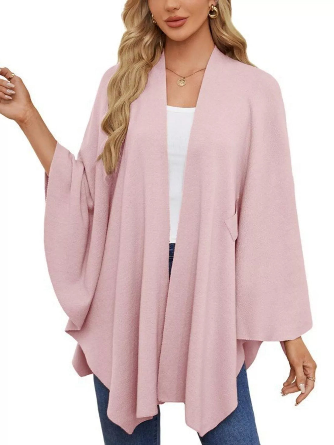 Blush pink cape shawl with long draped sleeves, open front, and front tie at waist