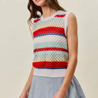 Women’s sweater knit tank top paired with a light blue skirt, striped knit