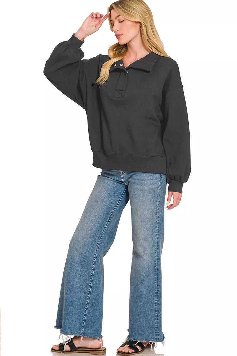 Black fleece half-snap sweatshirt, long sleeves and dropped shoulders
