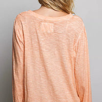 Peach lightweight knit top back view with long sleeves