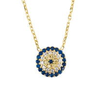 Gold evil eye pendant necklace with blue and clear jeweled circular charm