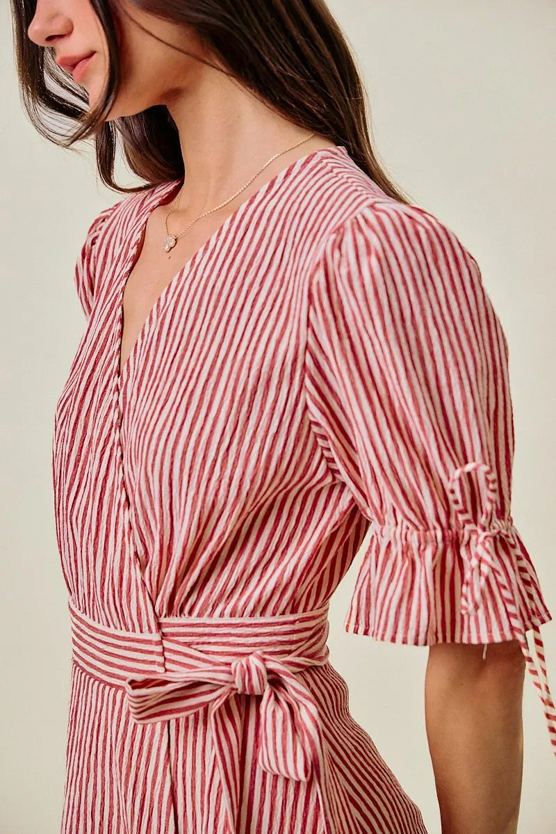 Red and white striped wrap midi dress with short ruffle sleeves and tie waist