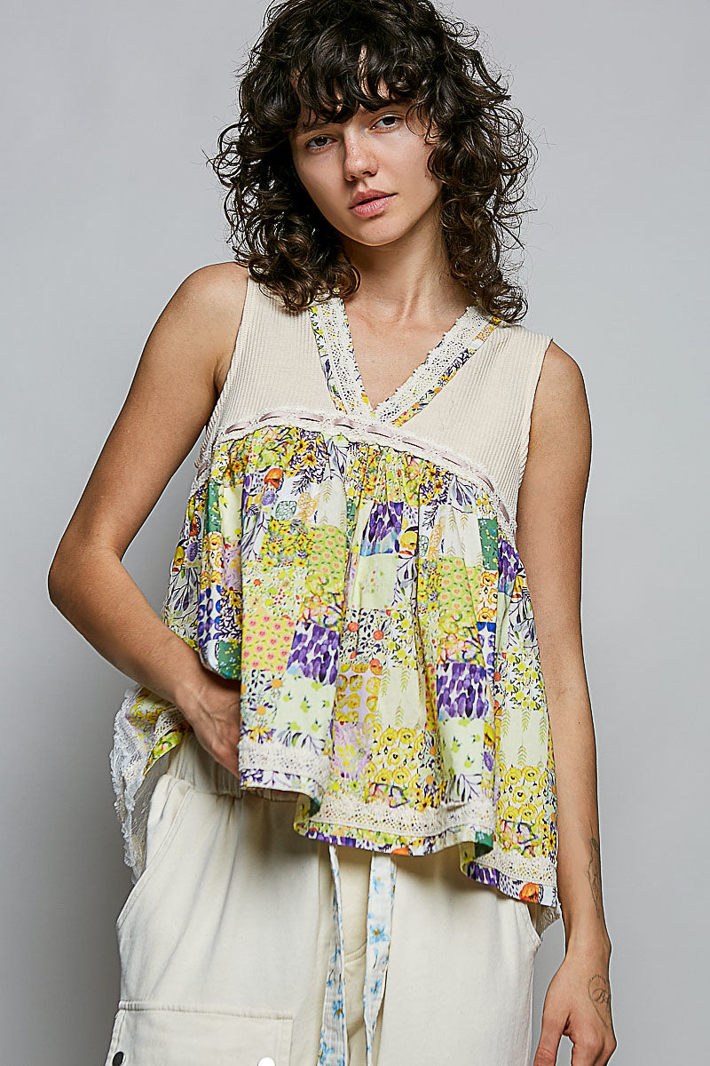 Vanilla cream sheer V-neck tank with floral print and lace trim