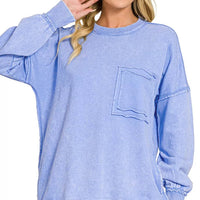 Women’s acid-wash French terry sweatshirt in cornflower blue, raw-edge cuffs, front pocket