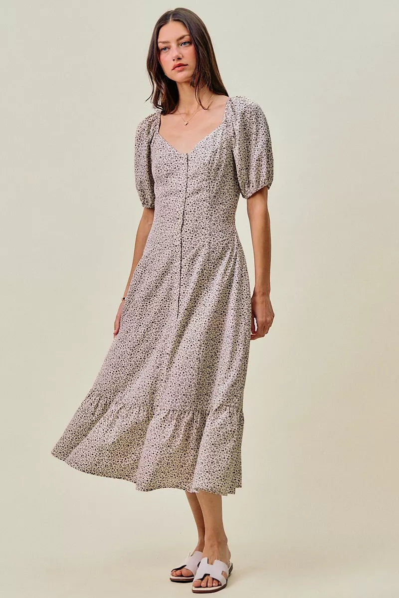 Ditsy floral midi dress full-body view, elastic waist, puff sleeves, self belt tie