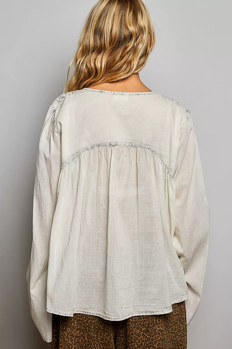 Back view pale grey embroidered button-front woven shirt with gathered yoke