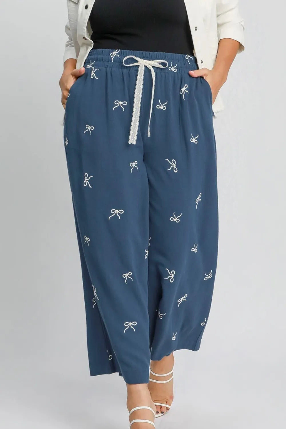 Dusty blue wide-leg drawstring pants with bow embroidery and lace-trim tie