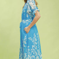 Blue floral tie-waist midi dress with short ruffled sleeves, side profile view