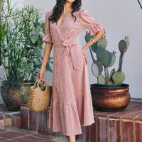 Red-and-white striped wrap midi dress with V-neck, tied waist, short puff sleeves
