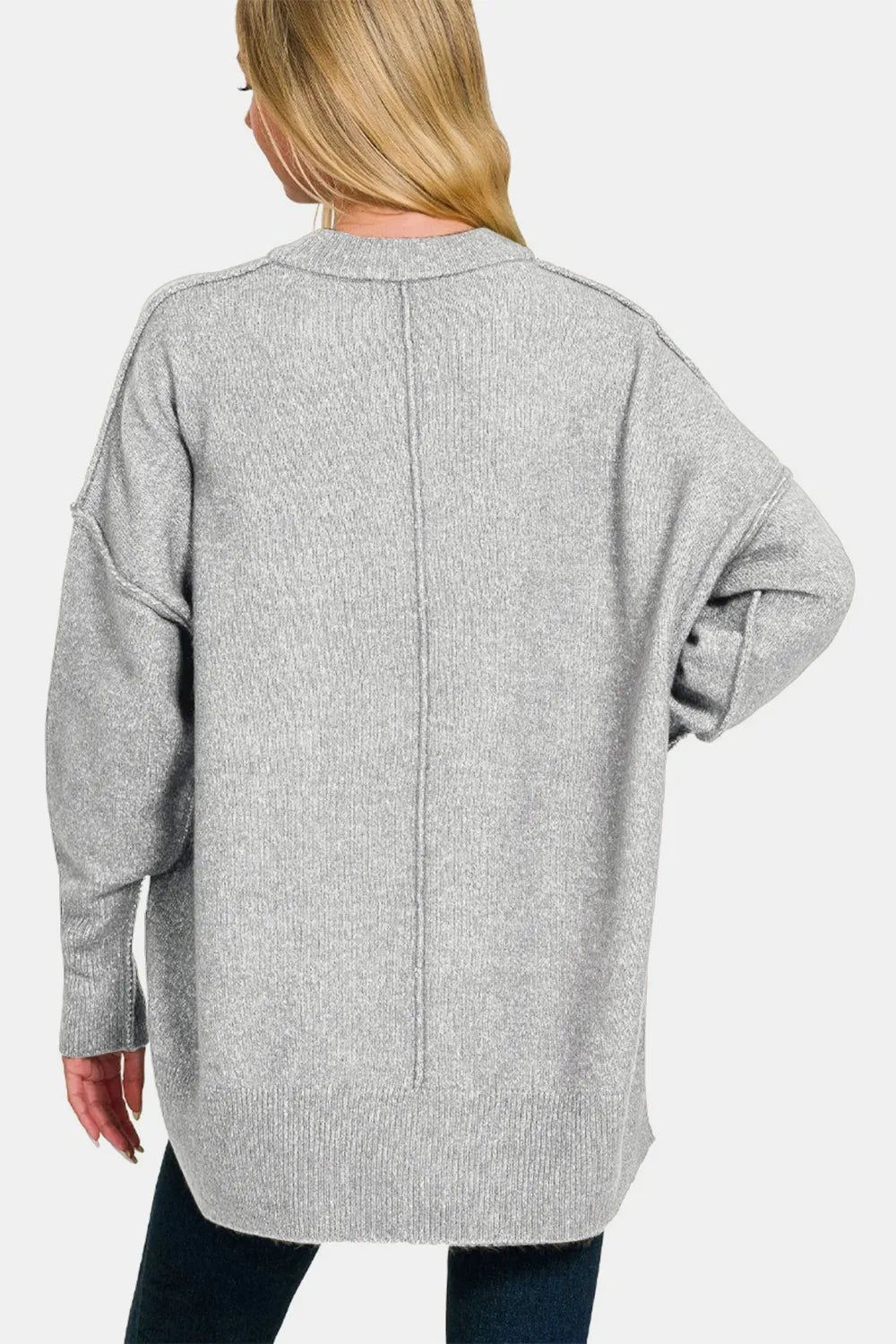 Grey drop-shoulder sweater back view with long sleeves and vertical seam