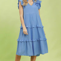 Light blue tiered midi dress with ruffle sleeves and layered skirt