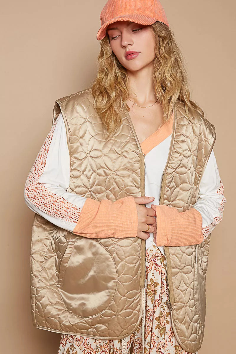 Quilted mocha front-zip vest with V-neck and visible side pockets