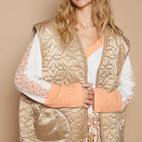 Quilted mocha front-zip vest with V-neck and visible side pockets