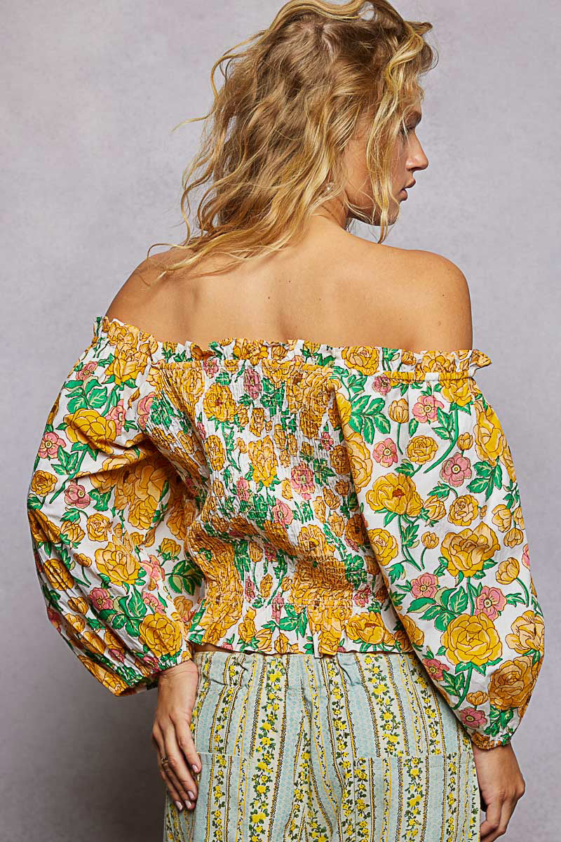 Floral off-shoulder smocked blouse with gathered back yoke and long puff sleeves