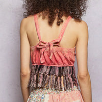 Back view of pink lace tank top with crisscross tie straps