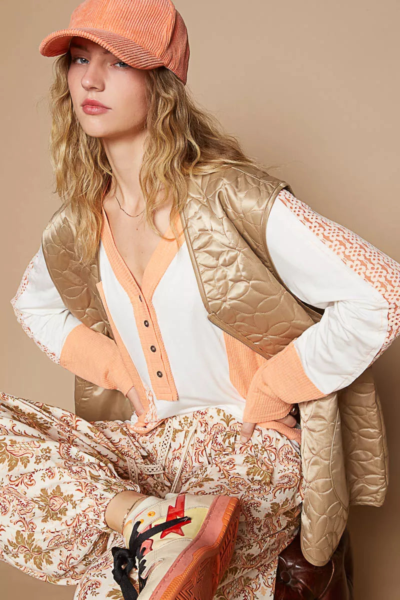 Quilted mocha front-zip vest with V-neck and side pockets