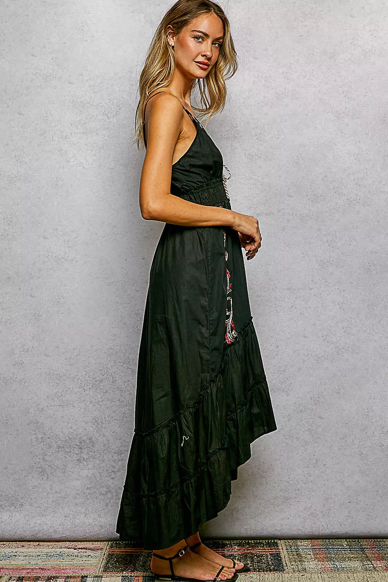 Black embroidered cami midi dress, side view with tassel tie detail