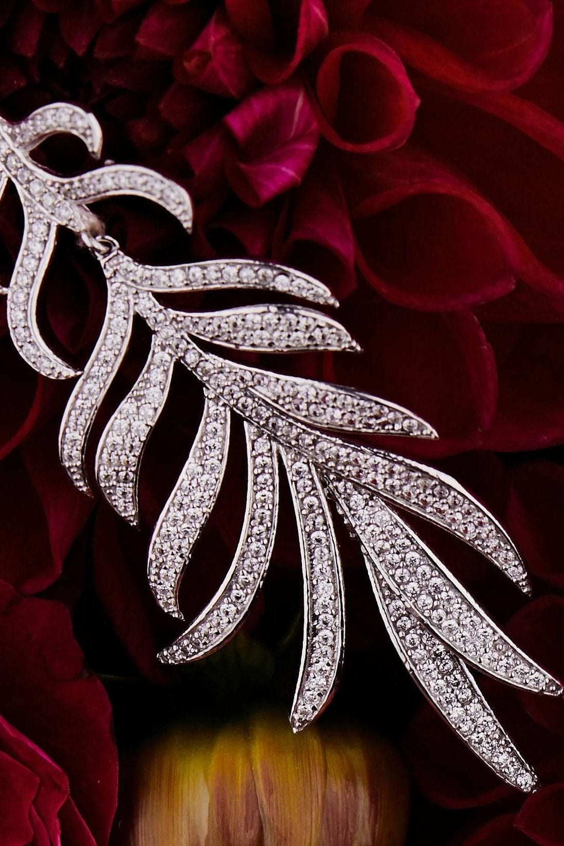 Silver feathered leaf drop earring with pavé stones