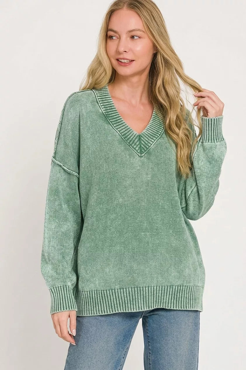 Green washed oversized V-neck sweater with long sleeves and ribbed trim at neckline