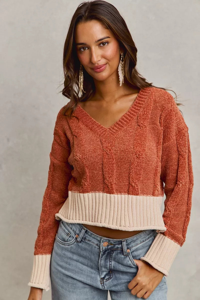 Rust chenille cable knit V-neck cropped sweater with cream contrast waistband