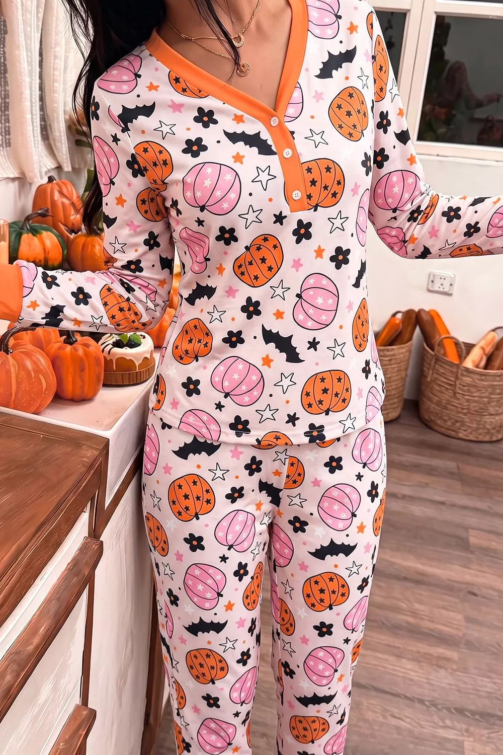 Dusty pink pumpkin-print long-sleeve loungewear set with orange button-front top