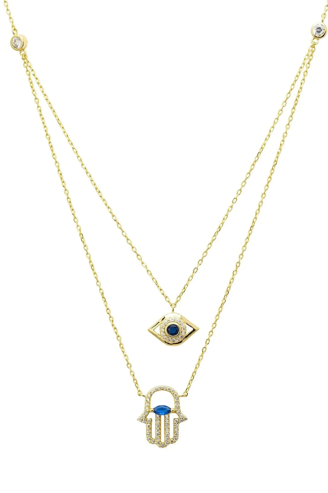 Gold layered hamsa and evil eye pendant necklace with blue enamel accents