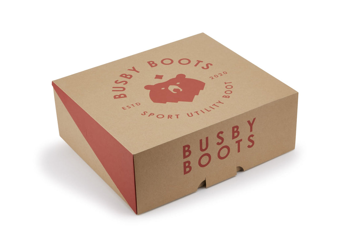 Busby Boots cardboard shoe box with red branding
