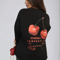Black oversized knitted jumper with large back cherry graphic and text design