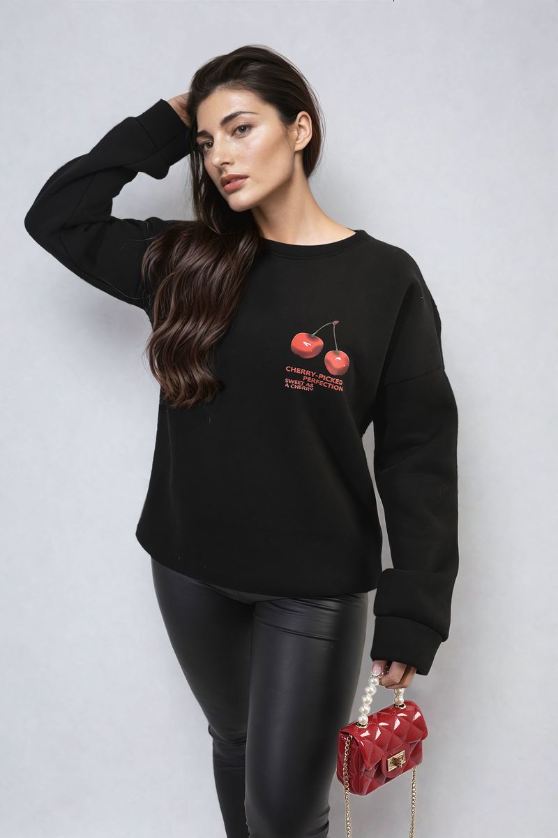 Black oversized knitted jumper with cherry front graphic and long sleeves