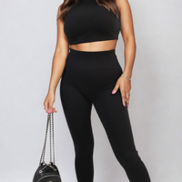 Black high-waisted ankle leggings with wide waistband, full length fit.