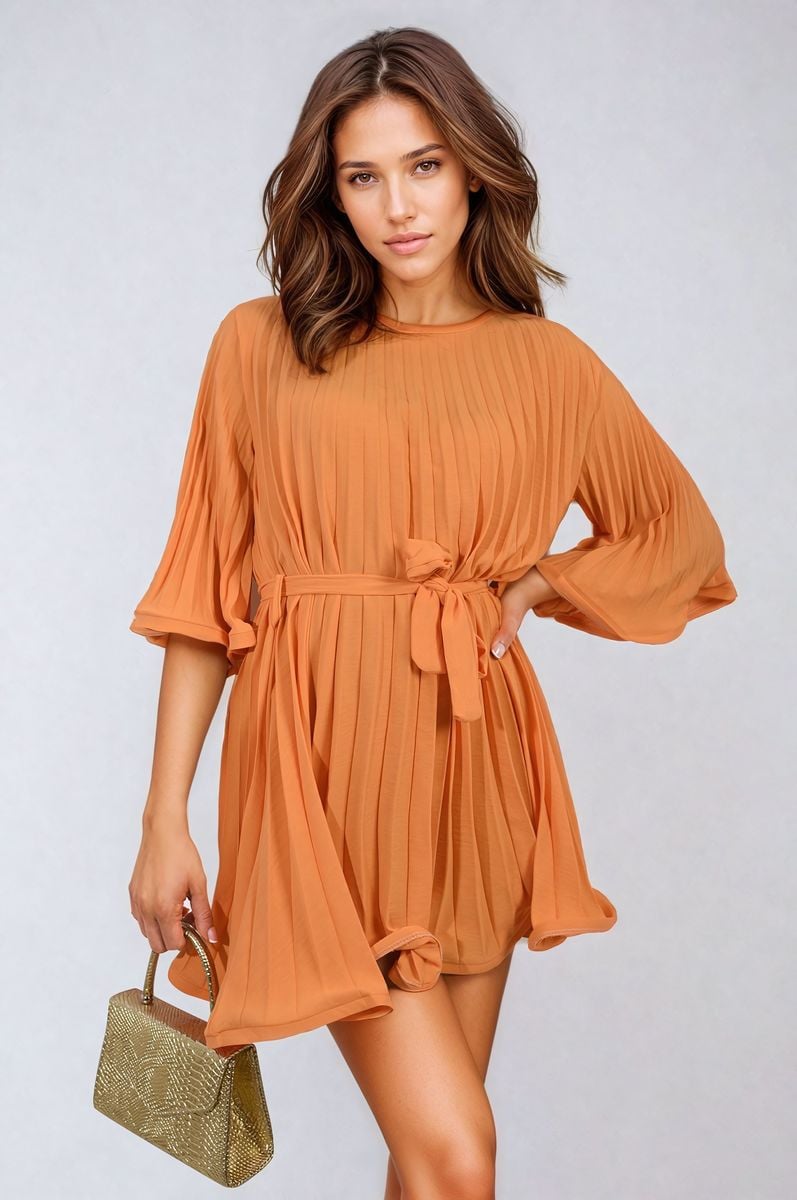 Orange pleated mini dress with tie waist and wide elbow-length sleeves