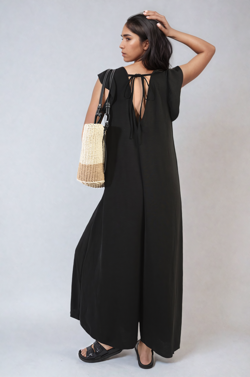 Black wide-leg jumpsuit with V-neck and open back tie straps
