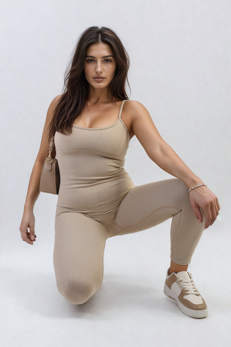 Beige fitted jumpsuit with scoop neck and thin straps, sleeveless one-piece