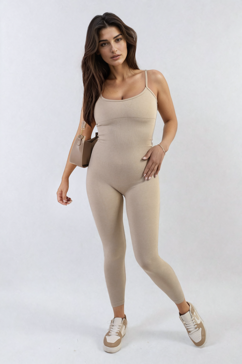 Beige fitted jumpsuit with scoop neck and thin spaghetti straps, full length