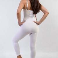 White bodycon jumpsuit with scoop neck and slim spaghetti straps