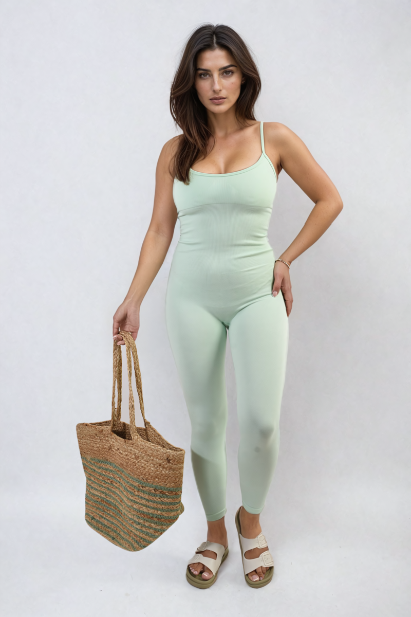 Mint bodycon jumpsuit with scoop neck and slim straps, fitted full-length legs