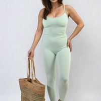 Mint bodycon jumpsuit with scoop neck and slim straps, fitted full-length legs