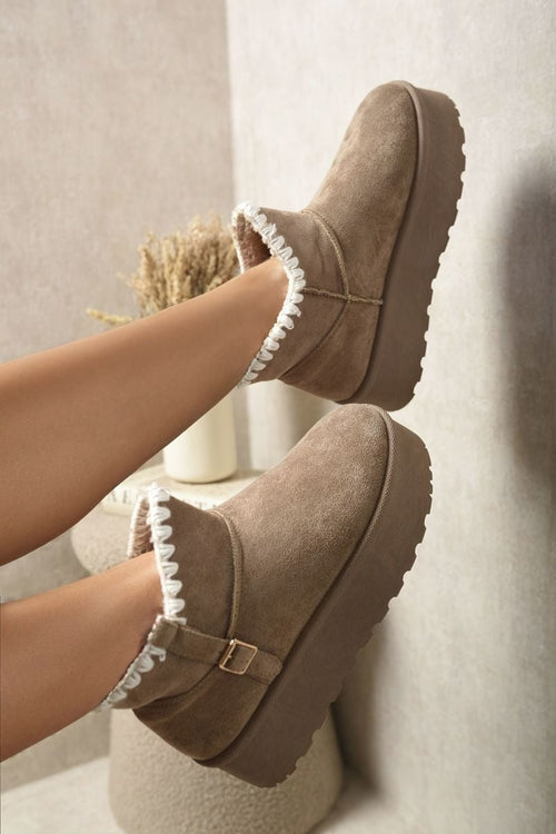 Mushroom brown suede ankle boots with faux fur lining, side buckle strap, and platform sole.