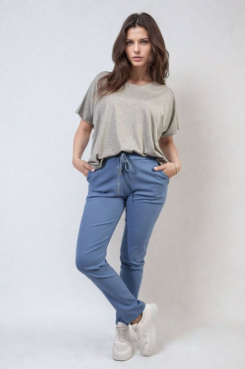 Blue drawstring tapered trousers with side pockets